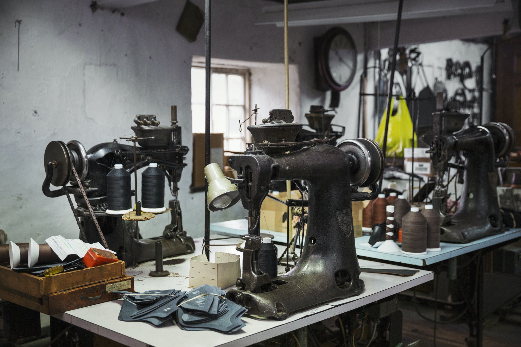 Sewing machines in a shoemaker's workshop.